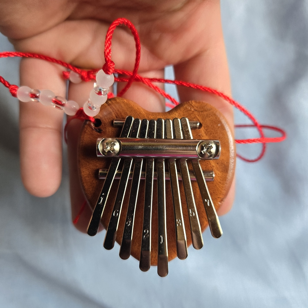 Heart-Shaped Kalimba with Red Cord
